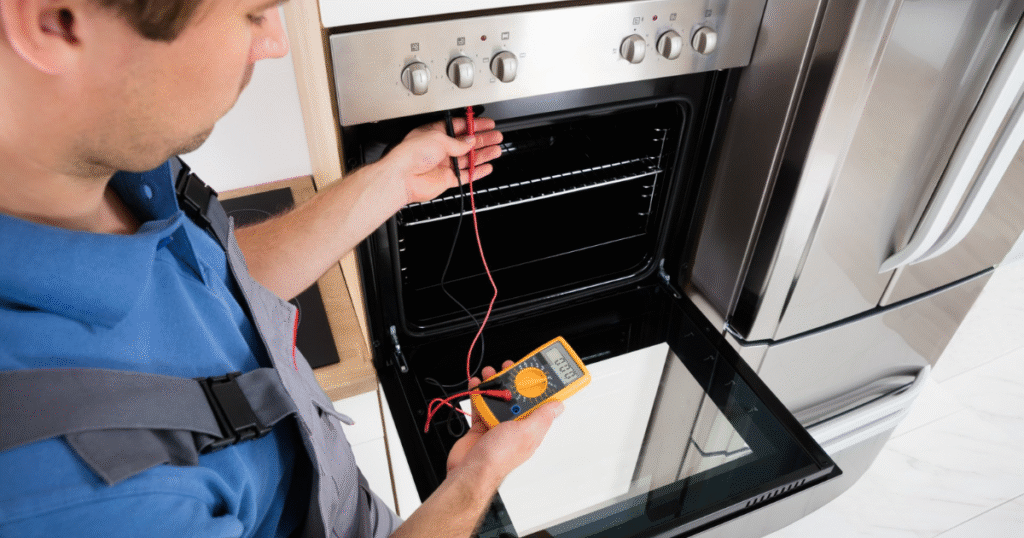 KitchenAid Oven Not Heating Culver City: Your Go-To Repair Guide 1 Technician repairing KitchenAid oven not heating issue in Culver City home